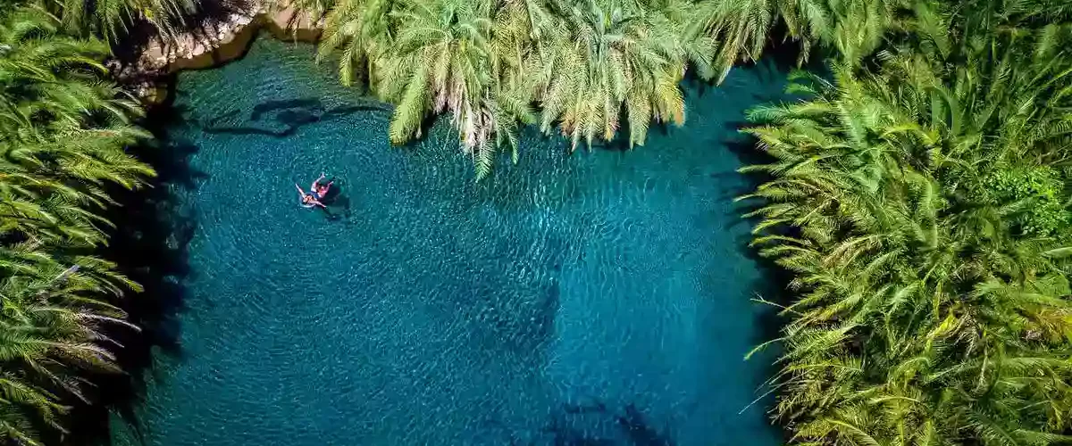 Kikuletwa Chemka Hot Spring (Maji Moto), a serene and crystal-clear natural spring.
