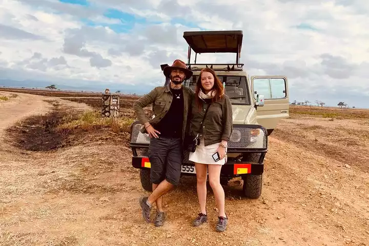 A vehicle on a self-drive adventure in Mikumi National Park, surrounded by wildlife and nature.