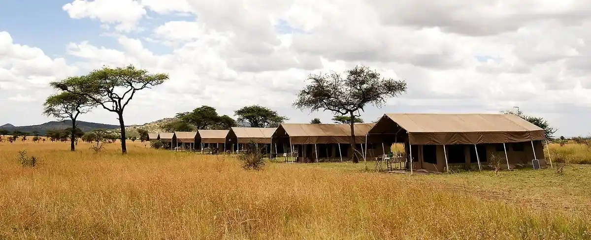 Exterior view of Serengeti Katikati Tented Camp, surrounded by the beauty of Serengeti National Park.
